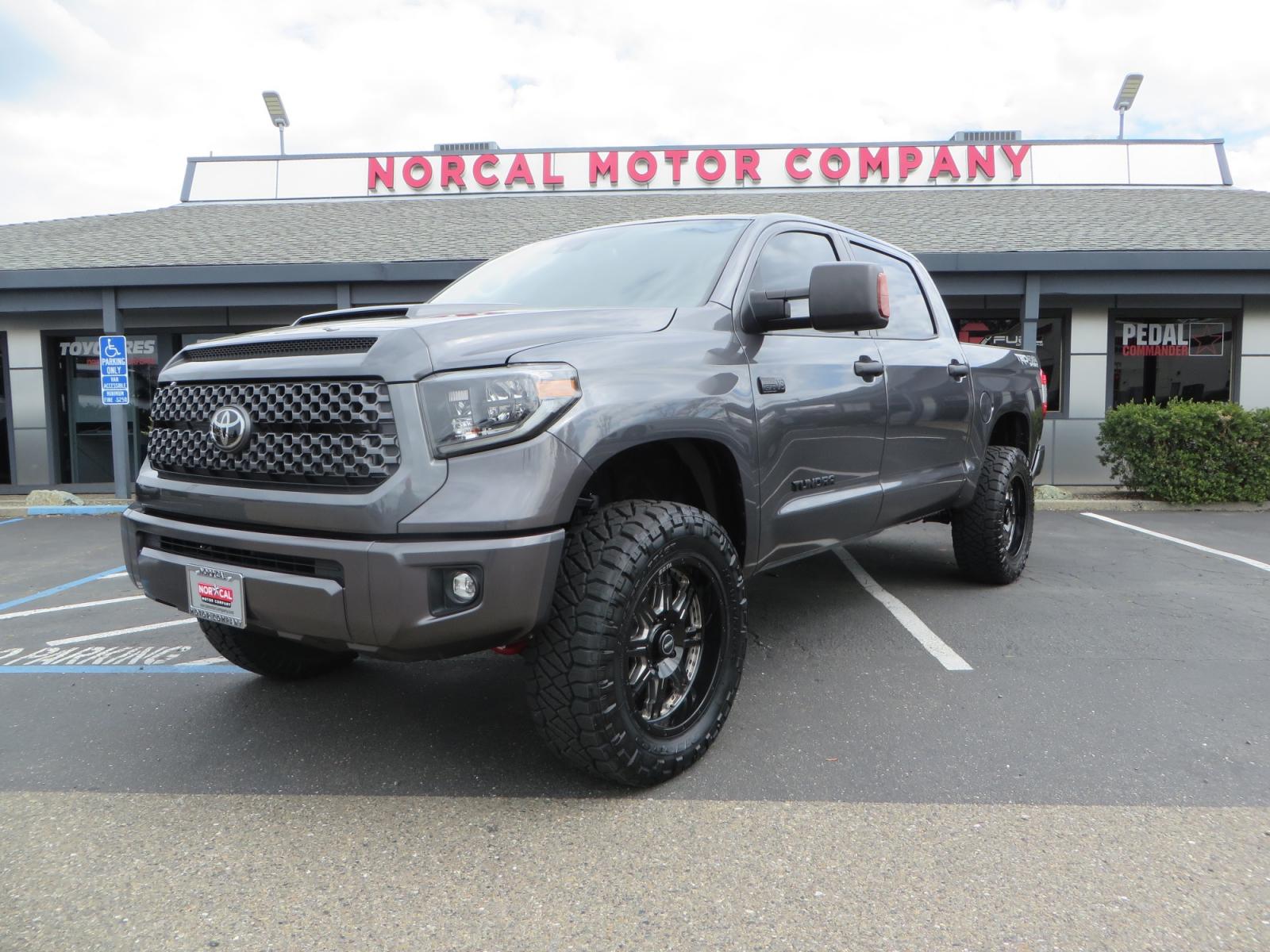 2021 CHARCOAL /GREY Toyota Tundra SR5 (5TFDY5F16MX) with an 5.7L V8 OHV 16V engine, automatic transmission, located at 2630 Grass Valley Highway, Auburn, CA, 95603, (530) 508-5100, 38.937893, -121.095482 - Features a Zone Offroad level kit, 20" SOTA wheels, 35" Nitto Ridge Grappler tires, Fox rear shocks, Air bags, front and rear TRD sway bars, and Window tint. - Photo #0